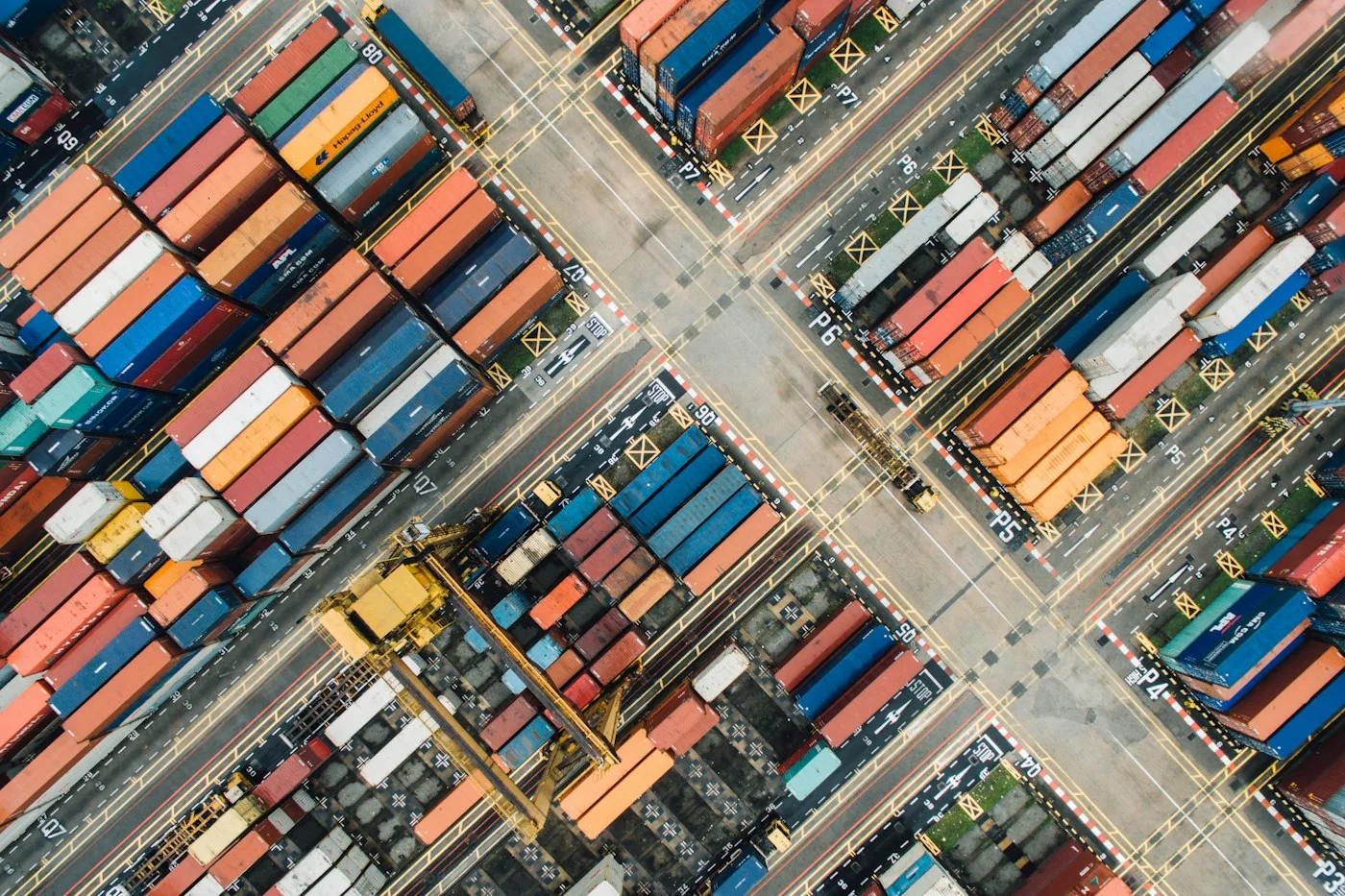 Shipping containers in a cargo port, illustrative industry image